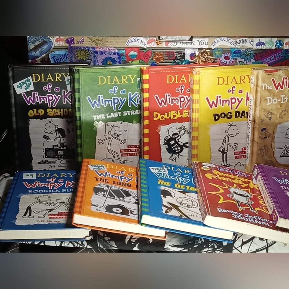 SALE FOR $70. SET OF 10 DIARY THE WIMPY KID BOOKS